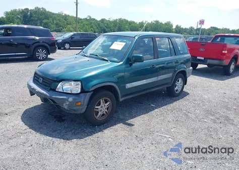 1999 Honda Cr-V Ex z USA, uszkodzony, nr VIN JHLRD1863XC069299